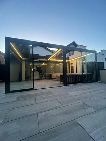 Conceptual coastal courtyard with a pergola, screens and low outdoor lounge